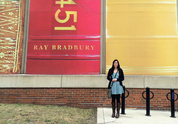 Me standing next to Fahrenheit 451, by Ray Bradbury.